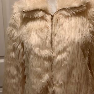 White faux fur coat